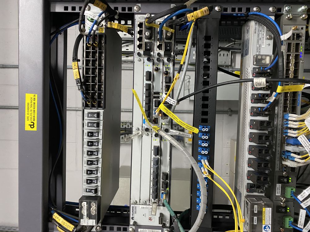 Telecom equipment rack with fiber installation